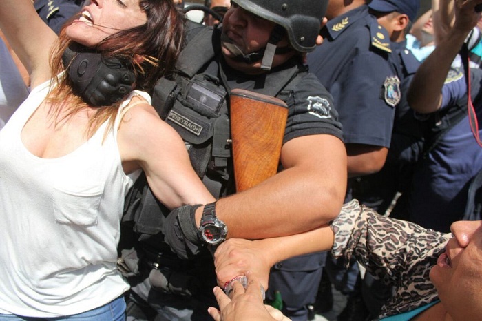 At least dozen injured in clashes between police, protesters in Argentina 
